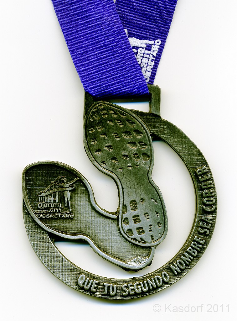 2011 Queretaro MX Half Marathon 470.jpg - It says: "Your second name is running"